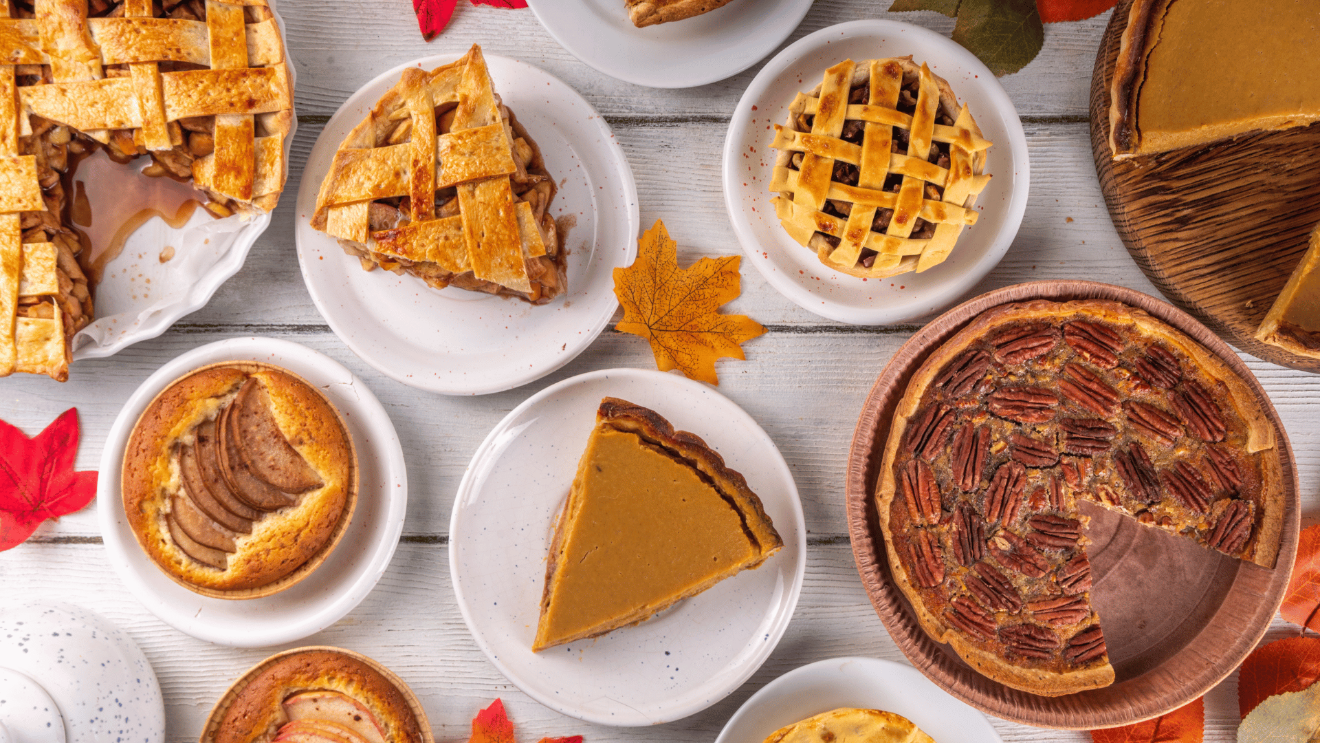Table filled with cozy fall recipes like soup, pie, and cookies preserved on Mealmento