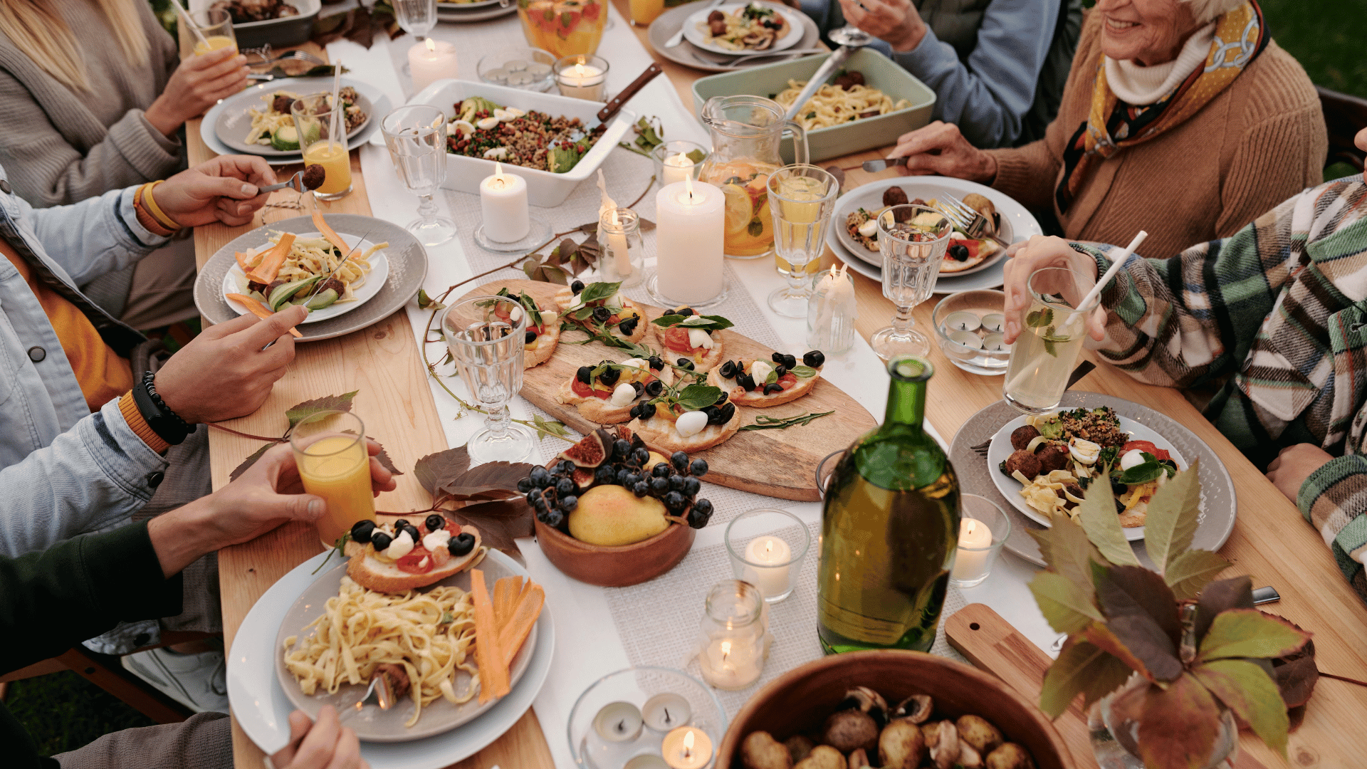 Family reunion picnic table filled with dishes and laughter Mealmento