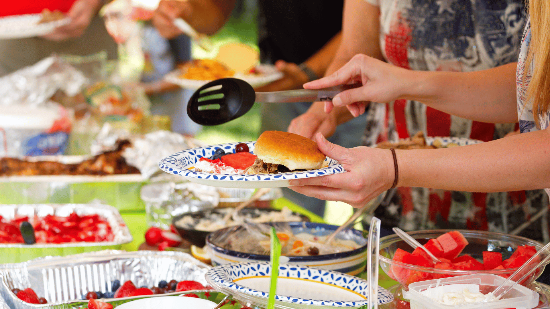 A family-style table filled with shared dishes, balanced and organized with Mealmento
